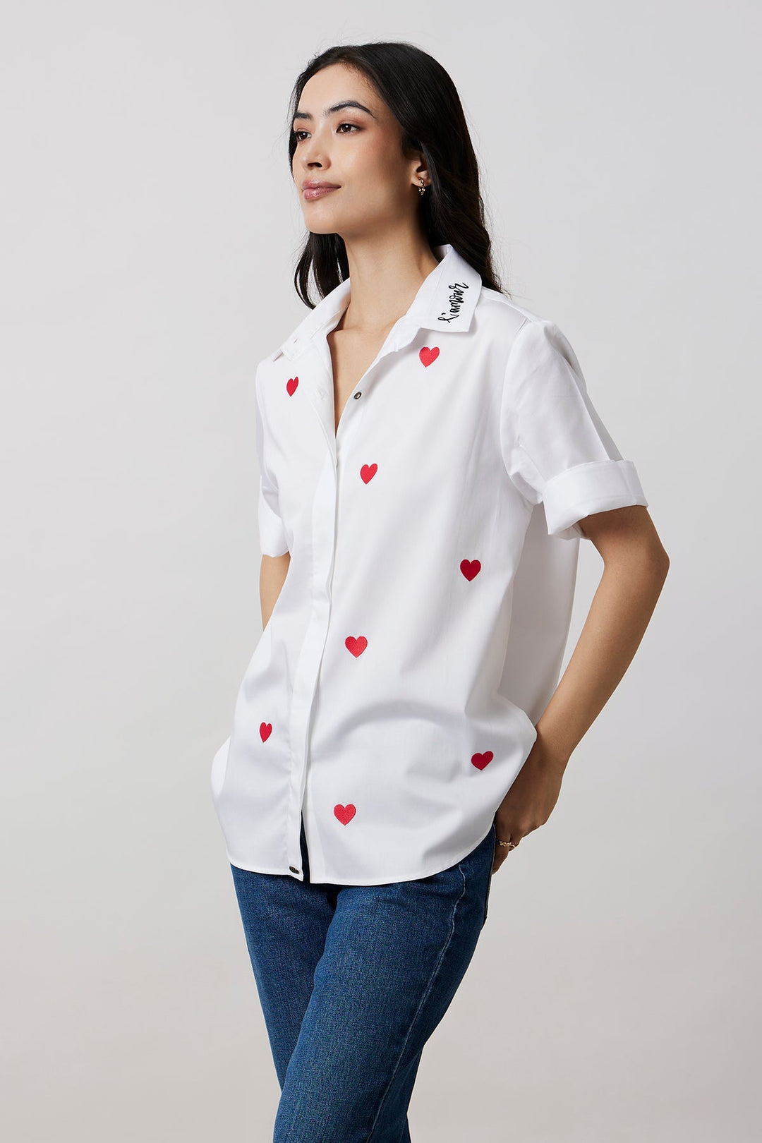 Karishma Kapoor in White Red Heart Embroidered Shirt