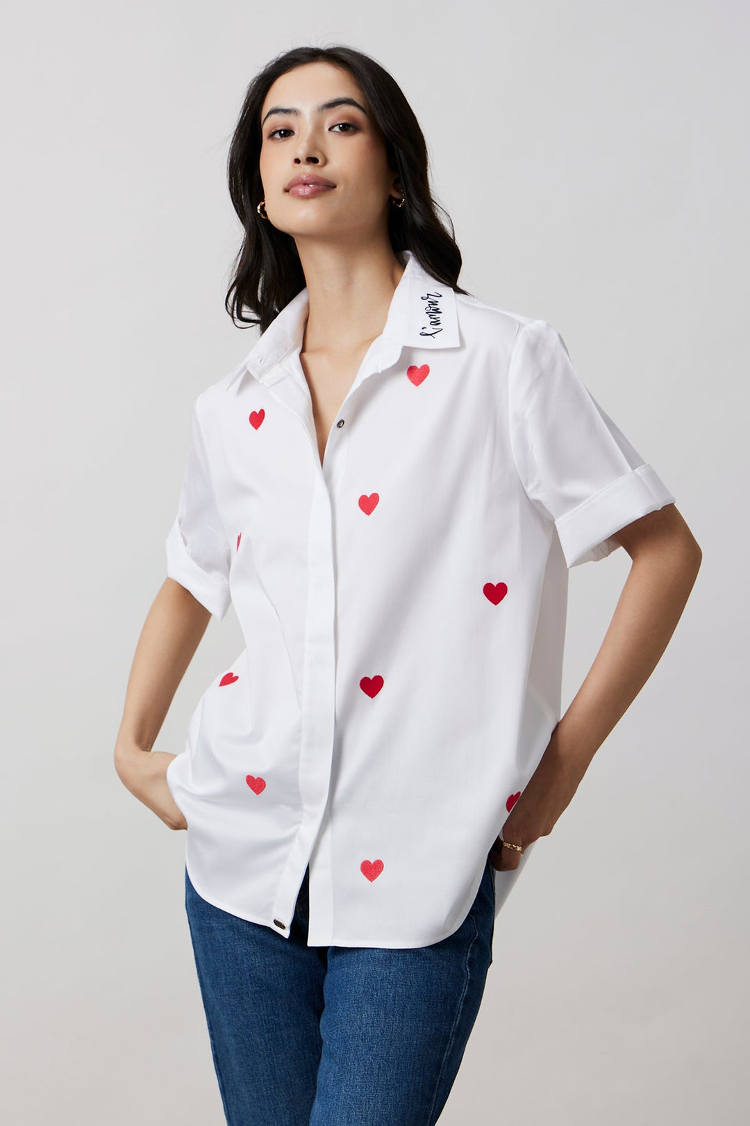 Karishma Kapoor in White Red Heart Embroidered Shirt